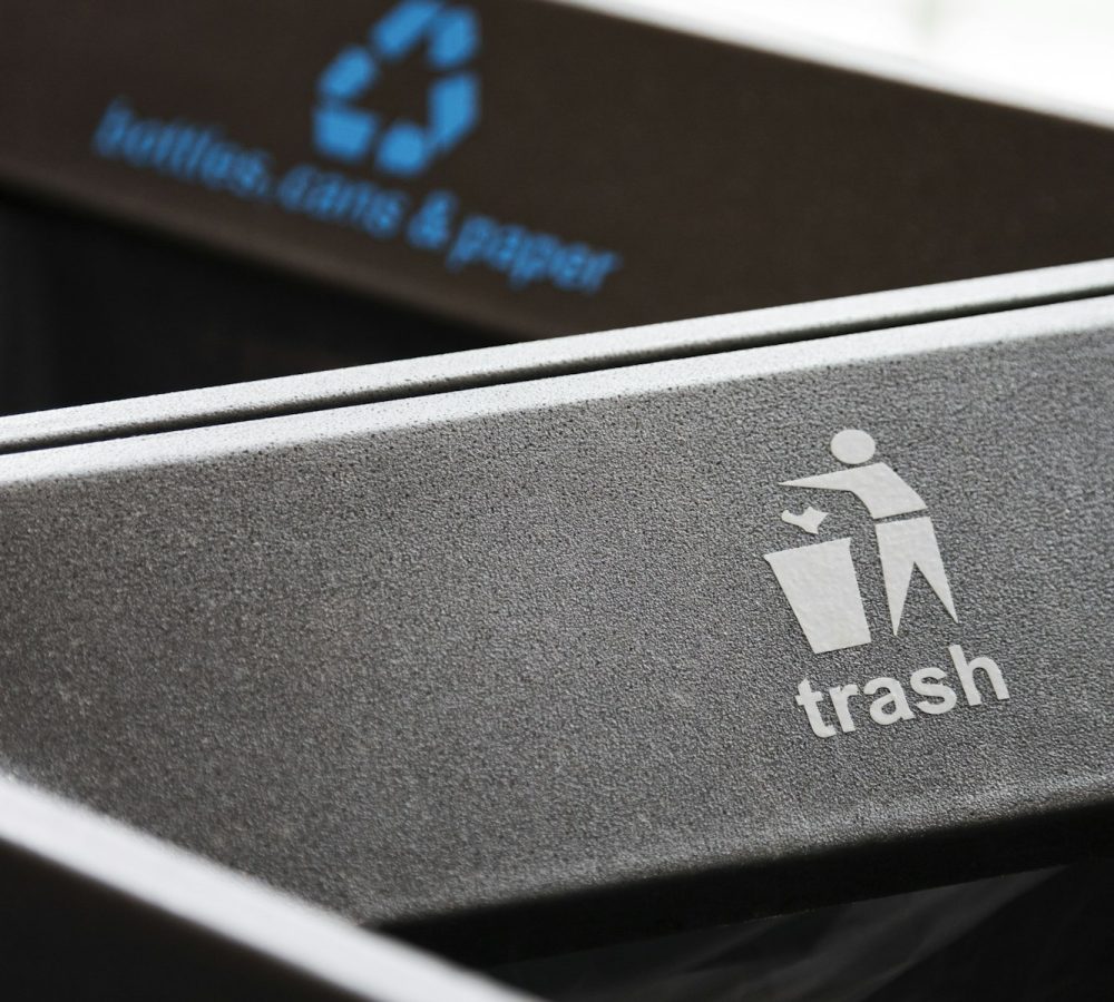 A closeup of recylcling bins for trash.