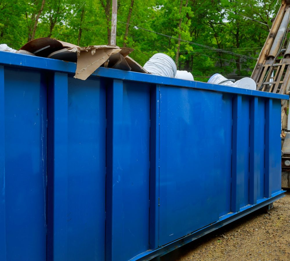 Truck loading a full recycling container trash dumpsters being with garbage container trash